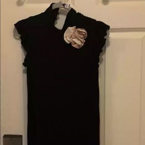 Turtleneck blouse with fly sleeves and cloth rose